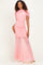 woman wearing a pink ruched maxi dress with short sleeves and a fitted silhouette