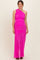 woman wearing a vibrant pink one-shoulder maternity dress with ruching and a flowing skirt
