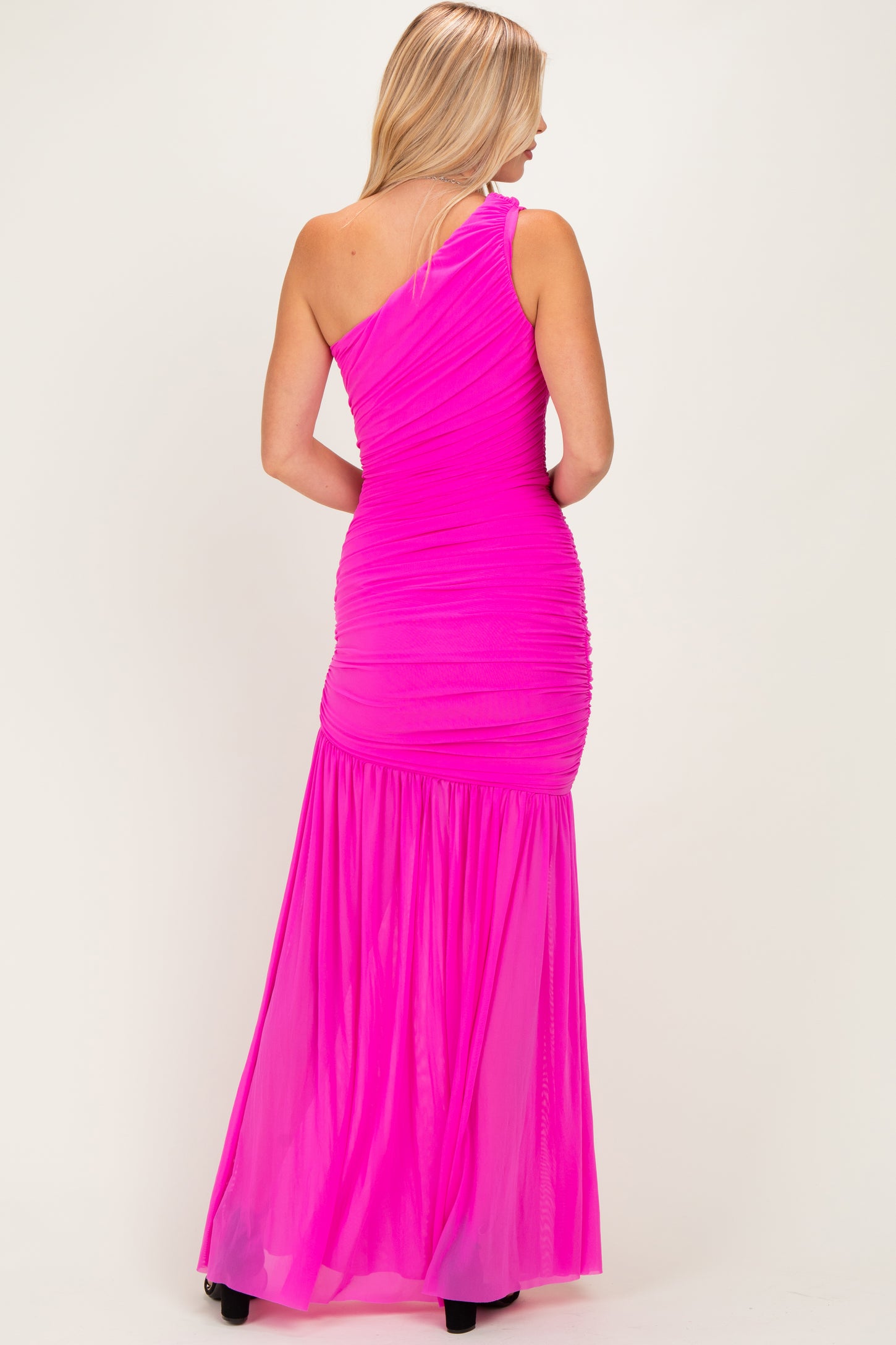 women's hot pink one-shoulder maxi dress with ruched detailing and a flowing sheer skirt