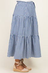 maternity wear blue and white gingham tiered maxi skirt with a tie waist detail, worn with espadrille flats