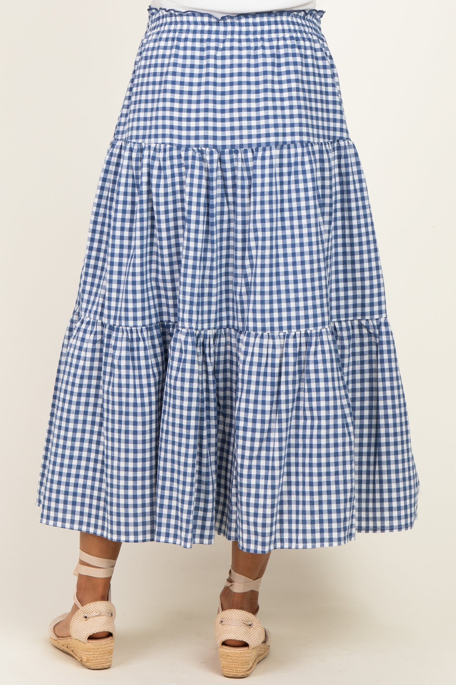 maternity wear blue and white gingham tiered maxi skirt with a flowy hem, model wearing espadrille sandals