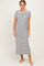 woman wearing a black and white striped short sleeve maxi dress