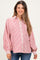 woman wearing a red and white striped maternity button-up shirt with puffy sleeves