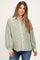 woman wearing a green and white striped maternity blouse with a button-up front and loose fit