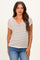 woman wearing a striped maternity top with a v-neck and short sleeves paired with blue jeans