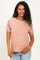 woman wearing a beige striped maternity top with short sleeves and holding her baby bump