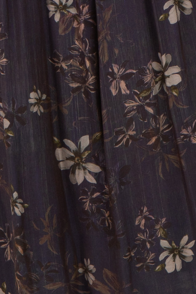 maternity wear fabric with purple background and floral print in white and muted colors