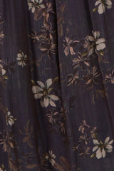 maternity wear fabric with purple background and floral print in white and muted colors