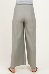 woman wearing gray wide-leg maternity pants, view from the back