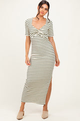 woman wearing a striped midi dress with a cinched front detail and short sleeves