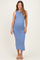 woman wearing a fitted light blue sleeveless maternity dress with ruching and a visible baby bump