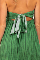 green maternity wear dress with a tied back detail and an open back design