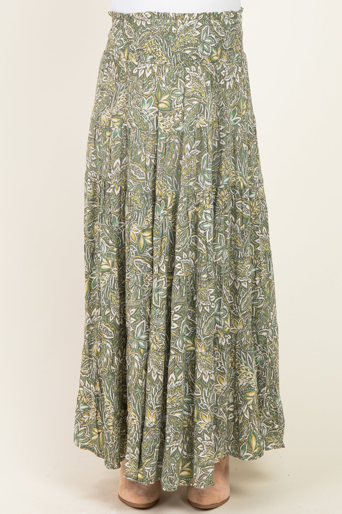 maternity wear green floral maxi skirt with an elastic waistband and tiered design, model not visible