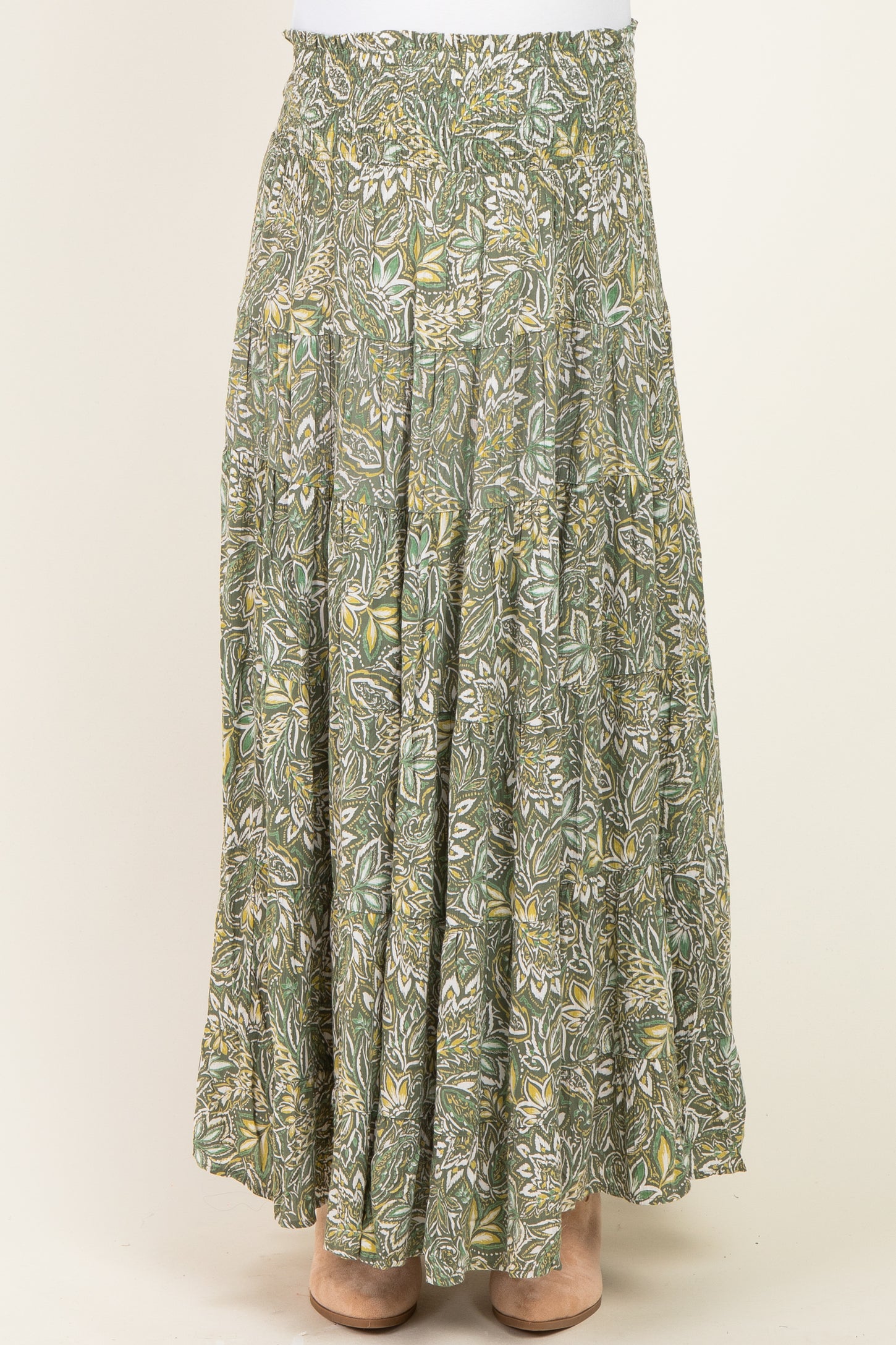maternity wear green floral maxi skirt with an elastic waistband and tiered design, model not visible