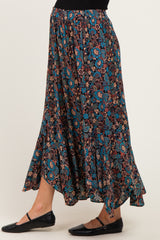 woman wearing a floral pattern maternity maxi skirt with a relaxed fit and flared hem