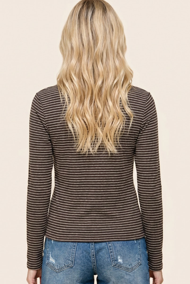 woman wearing a brown and cream striped long sleeve top with a fitted style, view from the back