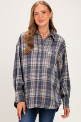 woman wearing a blue and gray plaid maternity shirt with button closure and relaxed fit