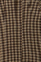 maternity wear in a brown and beige gingham pattern with a loose, flowing fit