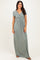 woman wearing a sage green short sleeve maxi dress with a twisted front detail and a relaxed fit