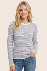 woman wearing a gray and white striped long sleeve top with a round neckline and relaxed fit