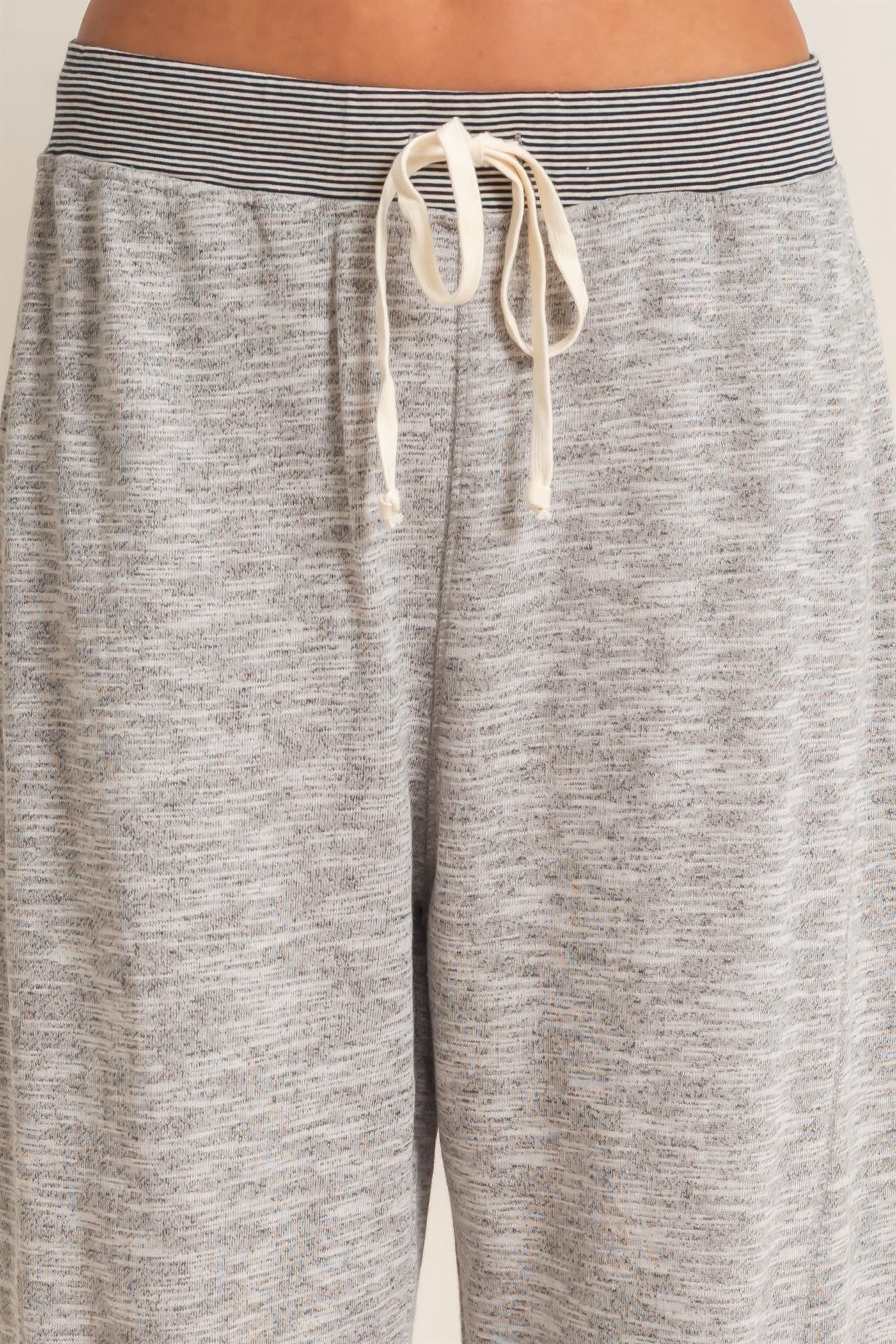 gray lounge pants with a drawstring waist and striped elastic band