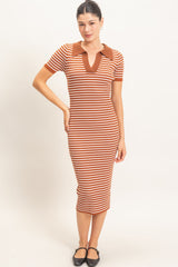 woman wearing a brown and orange striped midi dress with a collared neckline and short sleeves