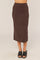 woman wearing a brown ribbed midi skirt and black slide sandals
