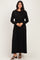 woman wearing a black long sleeve maxi dress with gathered waist detailing and relaxed fit