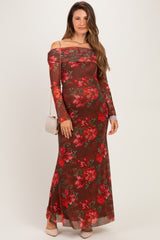 woman wearing a burgundy off-shoulder maxi dress with floral print, suitable for maternity wear