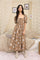 woman wearing a brown floral maxi dress with puff sleeves and a button-up front