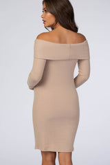 woman wearing a beige off-the-shoulder ribbed maternity dress from the back