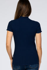 back view of woman wearing navy blue ribbed short sleeve mock neck top with lettuce edge trim