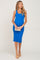 woman wearing a blue ribbed midi maternity dress and holding a clutch, showcasing her baby bump
