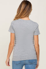 woman wearing a grey short sleeve maternity t-shirt, with a fitted silhouette, from the back