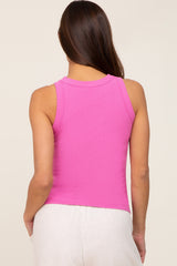 woman wearing a fitted pink maternity tank top, shown from the back