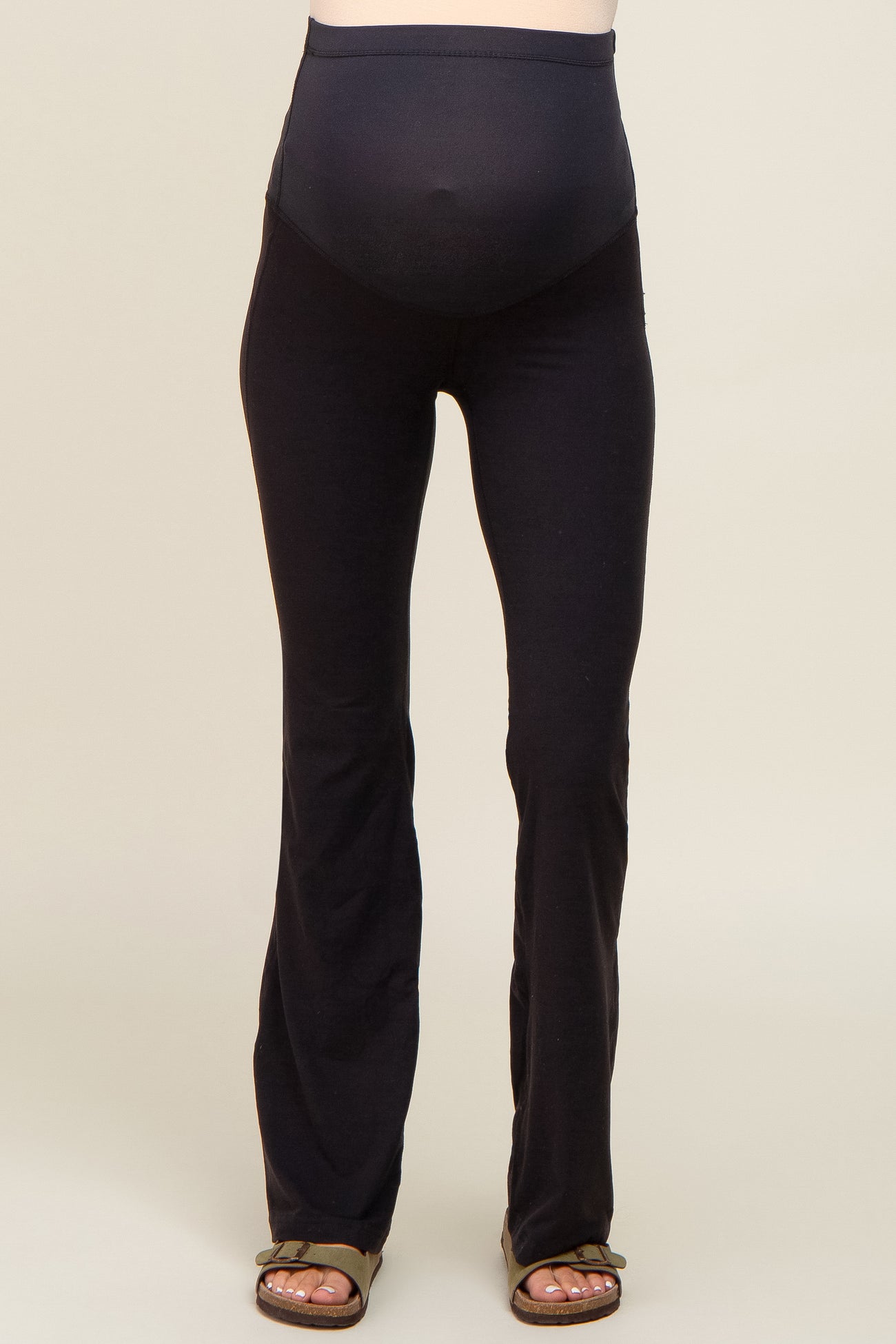 maternity wear black flared leggings with a supportive over-the-bump waistband