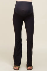 maternity wear black flared leggings with a supportive over-the-bump waistband