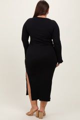woman wearing a black long sleeve plus size dress with a thigh-high slit and fitted silhouette, viewed from the back