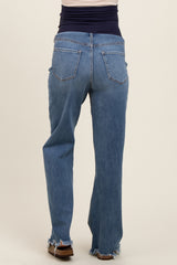 woman wearing maternity blue distressed straight leg jeans, showing the back view with a comfortable belly panel
